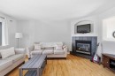 277 Inglewood Grove Se, Calgary, AB  - Indoor Photo Showing Living Room With Fireplace 
