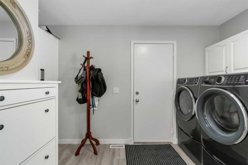 112 Hidden Vale Place Nw, Calgary, AB - Indoor Photo Showing Laundry Room