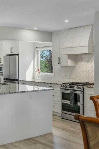 112 Hidden Vale Place Nw, Calgary, AB - Indoor Photo Showing Kitchen With Upgraded Kitchen
