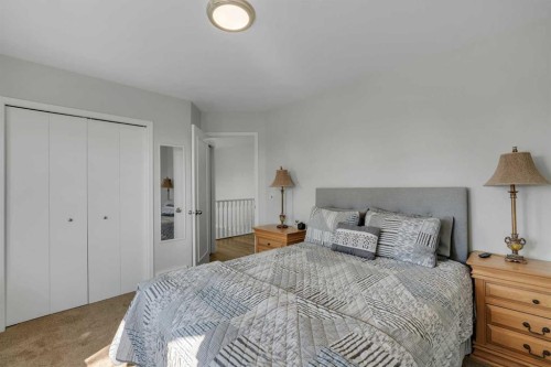 112 Hidden Vale Place Nw, Calgary, AB - Indoor Photo Showing Bedroom