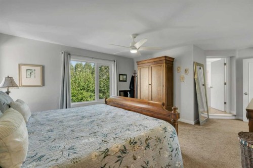 112 Hidden Vale Place Nw, Calgary, AB - Indoor Photo Showing Bedroom