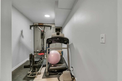 112 Hidden Vale Place Nw, Calgary, AB - Indoor Photo Showing Gym Room