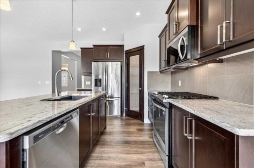 51 Evansborough Road Nw, Calgary, AB - Indoor Photo Showing Kitchen With Upgraded Kitchen