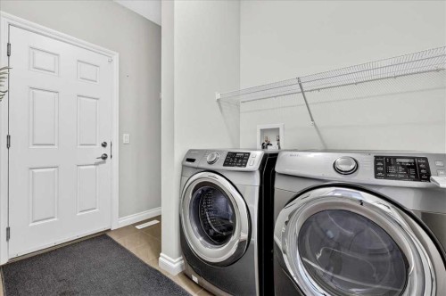 51 Evansborough Road Nw, Calgary, AB - Indoor Photo Showing Laundry Room