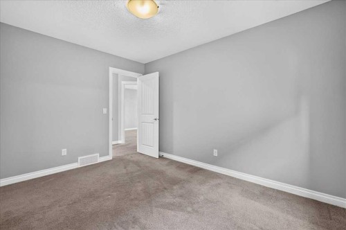 51 Evansborough Road Nw, Calgary, AB - Indoor Photo Showing Other Room