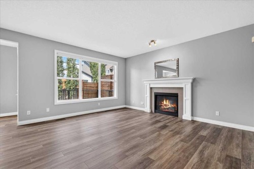 51 Evansborough Road Nw, Calgary, AB - Indoor Photo Showing Living Room With Fireplace