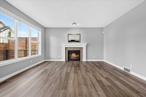 51 Evansborough Road Nw, Calgary, AB - Indoor Photo Showing Living Room With Fireplace