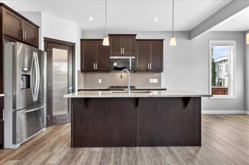 51 Evansborough Road Nw, Calgary, AB - Indoor Photo Showing Kitchen With Upgraded Kitchen