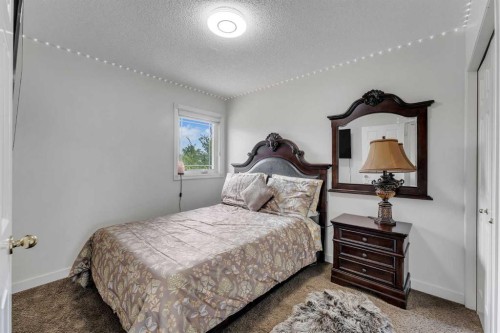 280140 Township Road 241A, Chestermere, AB - Indoor Photo Showing Bedroom