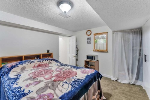 280140 Township Road 241A, Chestermere, AB - Indoor Photo Showing Bedroom