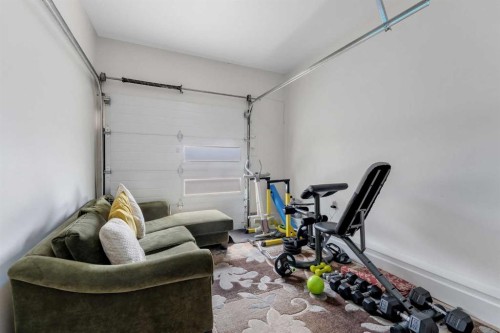 280140 Township Road 241A, Chestermere, AB - Indoor Photo Showing Garage