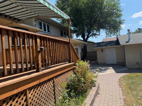 6407 Lombardy Crescent Sw, Calgary, AB - Outdoor With Deck Patio Veranda