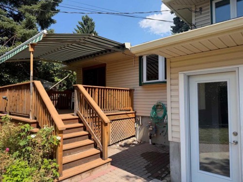 6407 Lombardy Crescent Sw, Calgary, AB - Outdoor With Deck Patio Veranda With Exterior