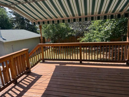 6407 Lombardy Crescent Sw, Calgary, AB - Outdoor With Deck Patio Veranda With Exterior