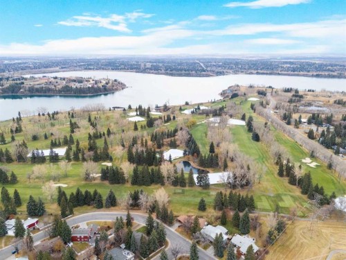 6407 Lombardy Crescent Sw, Calgary, AB - Outdoor With Body Of Water With View