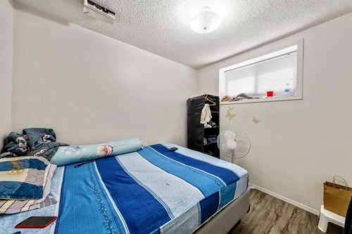 318 Applewood Drive Se, Calgary, AB - Indoor Photo Showing Bedroom