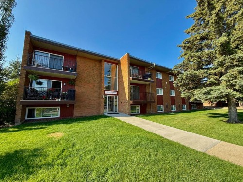 0-115 8 Avenue Sw, High River, AB - Outdoor With Facade