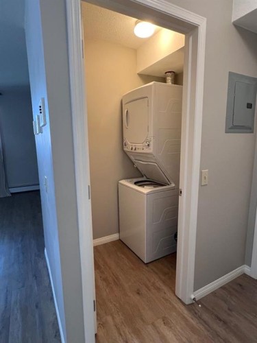 0-115 8 Avenue Sw, High River, AB - Indoor Photo Showing Laundry Room