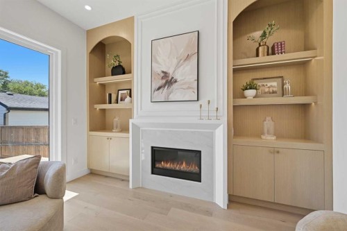409 28 Avenue Nw, Calgary, AB - Indoor Photo Showing Other Room With Fireplace