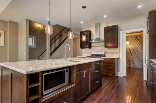 51 Aspen Meadows Green Sw, Calgary, AB - Indoor Photo Showing Kitchen With Upgraded Kitchen