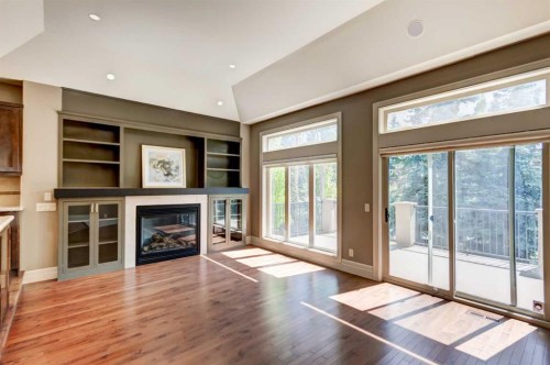 51 Aspen Meadows Green Sw, Calgary, AB - Indoor With Fireplace