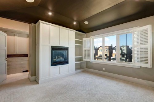 51 Aspen Meadows Green Sw, Calgary, AB - Indoor With Fireplace