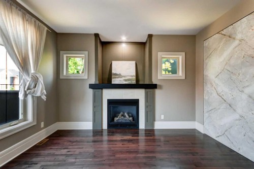 51 Aspen Meadows Green Sw, Calgary, AB - Indoor With Fireplace