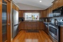 44 Ravenslea Crescent Se, Airdrie, AB  - Indoor Photo Showing Kitchen With Stainless Steel Kitchen With Double Sink 