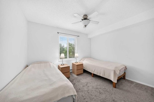 3425-3000 Millrise Point Sw, Calgary, AB - Indoor Photo Showing Bedroom