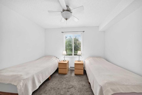 3425-3000 Millrise Point Sw, Calgary, AB - Indoor Photo Showing Bedroom