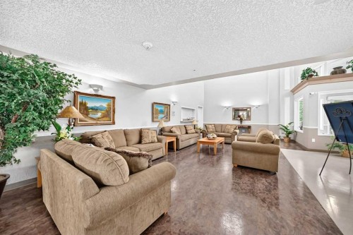 3425-3000 Millrise Point Sw, Calgary, AB - Indoor Photo Showing Living Room