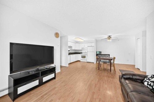 3425-3000 Millrise Point Sw, Calgary, AB - Indoor Photo Showing Living Room