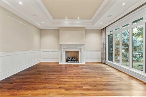 1020 Bel-Aire Drive Sw, Calgary, AB - Indoor Photo Showing Other Room With Fireplace
