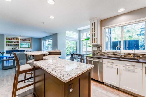99 Springbluff Boulevard Sw, Calgary, AB - Indoor Photo Showing Kitchen With Double Sink With Upgraded Kitchen
