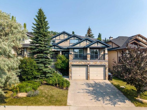 99 Springbluff Boulevard Sw, Calgary, AB - Outdoor With Facade