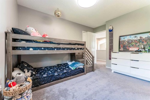 99 Springbluff Boulevard Sw, Calgary, AB - Indoor Photo Showing Bedroom