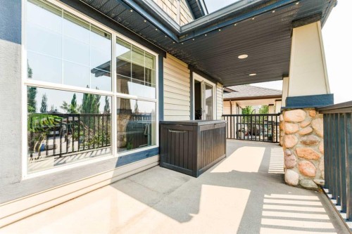 99 Springbluff Boulevard Sw, Calgary, AB - Outdoor With Deck Patio Veranda With Exterior