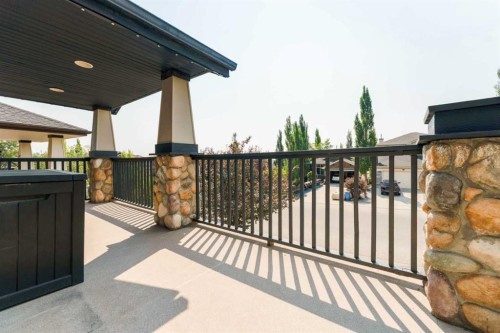 99 Springbluff Boulevard Sw, Calgary, AB - Outdoor With Balcony With Deck Patio Veranda With Exterior