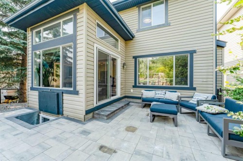 99 Springbluff Boulevard Sw, Calgary, AB - Outdoor With Deck Patio Veranda With Exterior