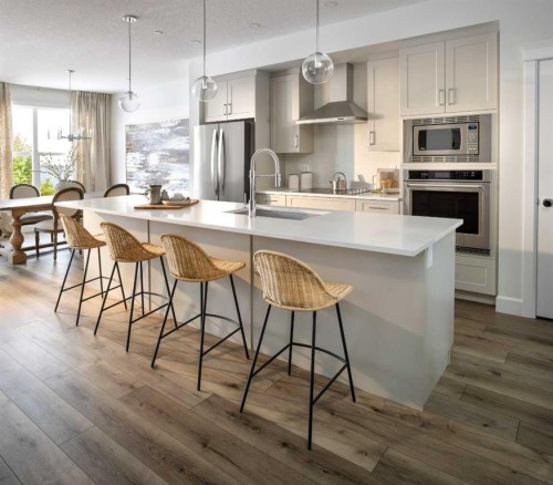99 Mercado Crescent Se, Calgary, AB - Indoor Photo Showing Kitchen With Stainless Steel Kitchen With Upgraded Kitchen