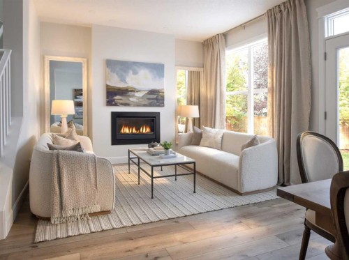 99 Mercado Crescent Se, Calgary, AB - Indoor Photo Showing Living Room With Fireplace
