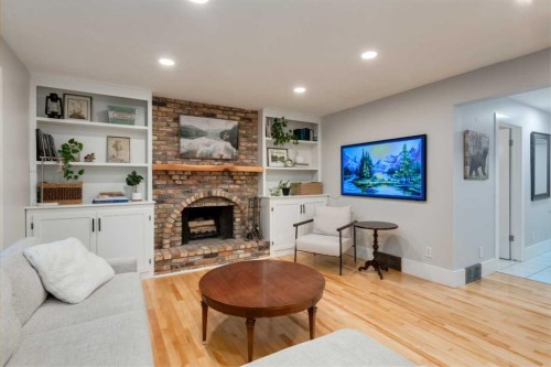 775 Strathcona Drive Sw, Calgary, AB - Indoor Photo Showing Living Room With Fireplace