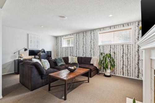 336 Mt Aberdeen Close Se, Calgary, AB - Indoor Photo Showing Living Room
