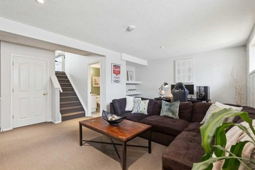 336 Mt Aberdeen Close Se, Calgary, AB - Indoor Photo Showing Living Room