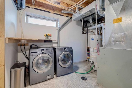 336 Mt Aberdeen Close Se, Calgary, AB - Indoor Photo Showing Laundry Room