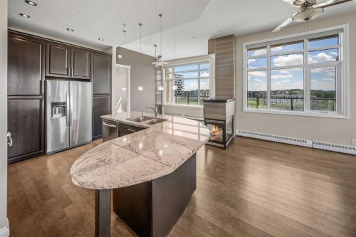 619-950 Centre Avenue Ne, Calgary, AB - Indoor Photo Showing Kitchen With Stainless Steel Kitchen With Double Sink With Upgraded Kitchen