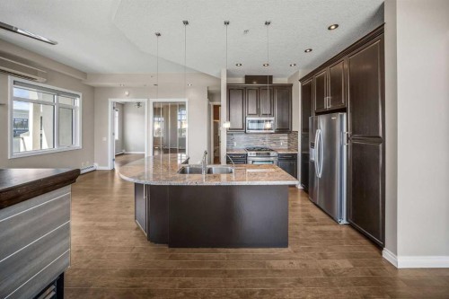 619-950 Centre Avenue Ne, Calgary, AB - Indoor Photo Showing Kitchen With Stainless Steel Kitchen With Double Sink With Upgraded Kitchen