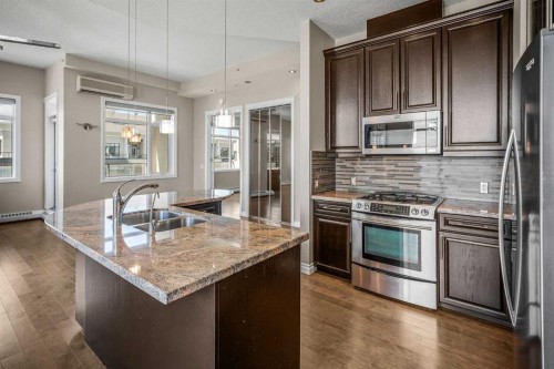 619-950 Centre Avenue Ne, Calgary, AB - Indoor Photo Showing Kitchen With Stainless Steel Kitchen With Double Sink With Upgraded Kitchen