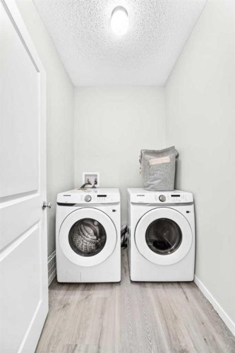 224 Corner Meadows Way, Calgary, AB - Indoor Photo Showing Laundry Room