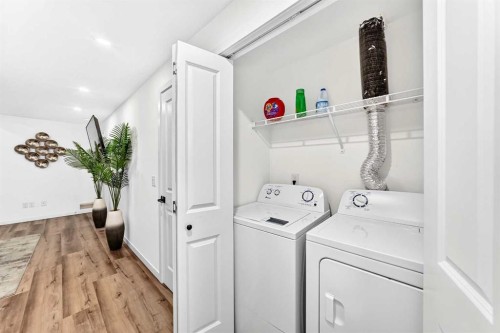 224 Corner Meadows Way, Calgary, AB - Indoor Photo Showing Laundry Room